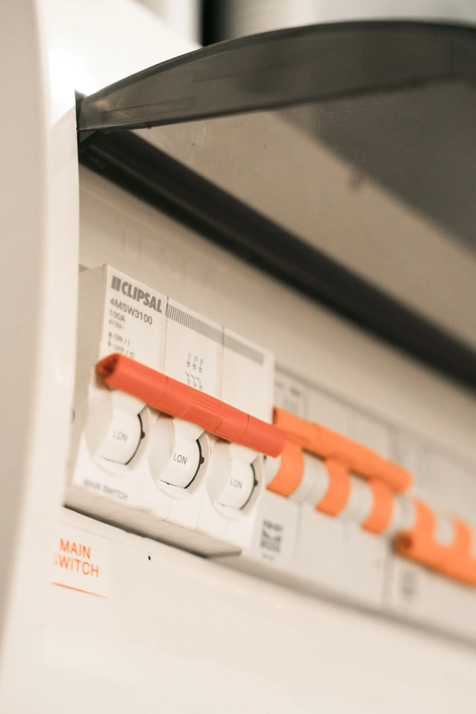 Close view of breaker handles in a distribution board