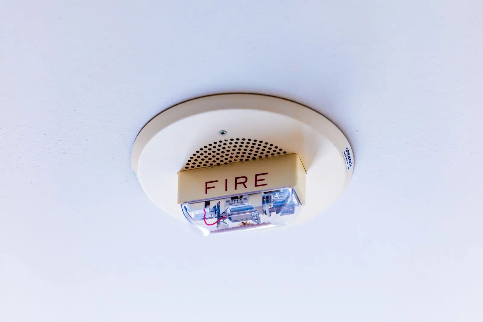 Ceiling-mounted fire alarm with a strobe light