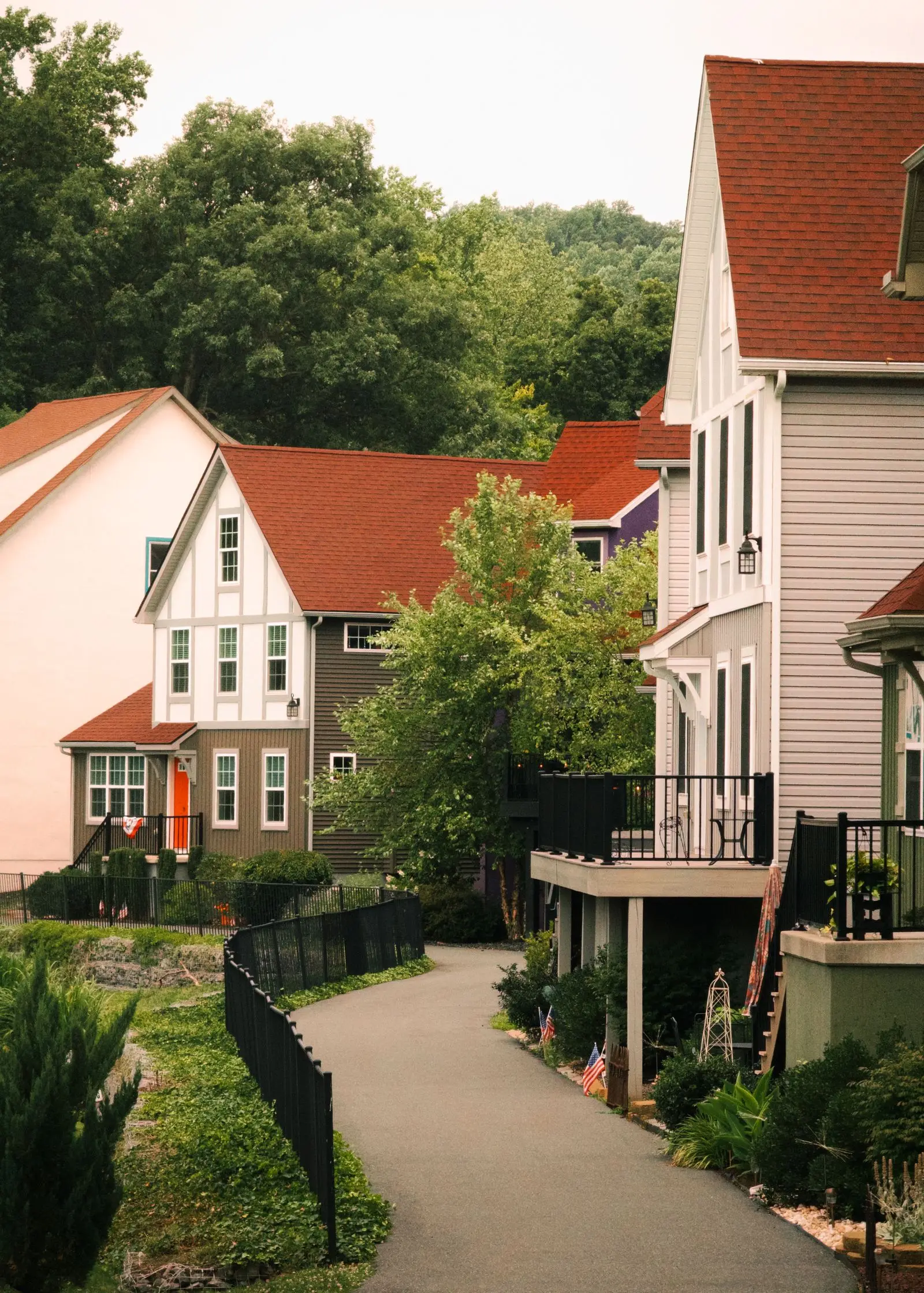 Close-set gabled houses with porches and balconies